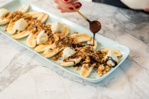 Bananas with ice cream and chocolate sauce